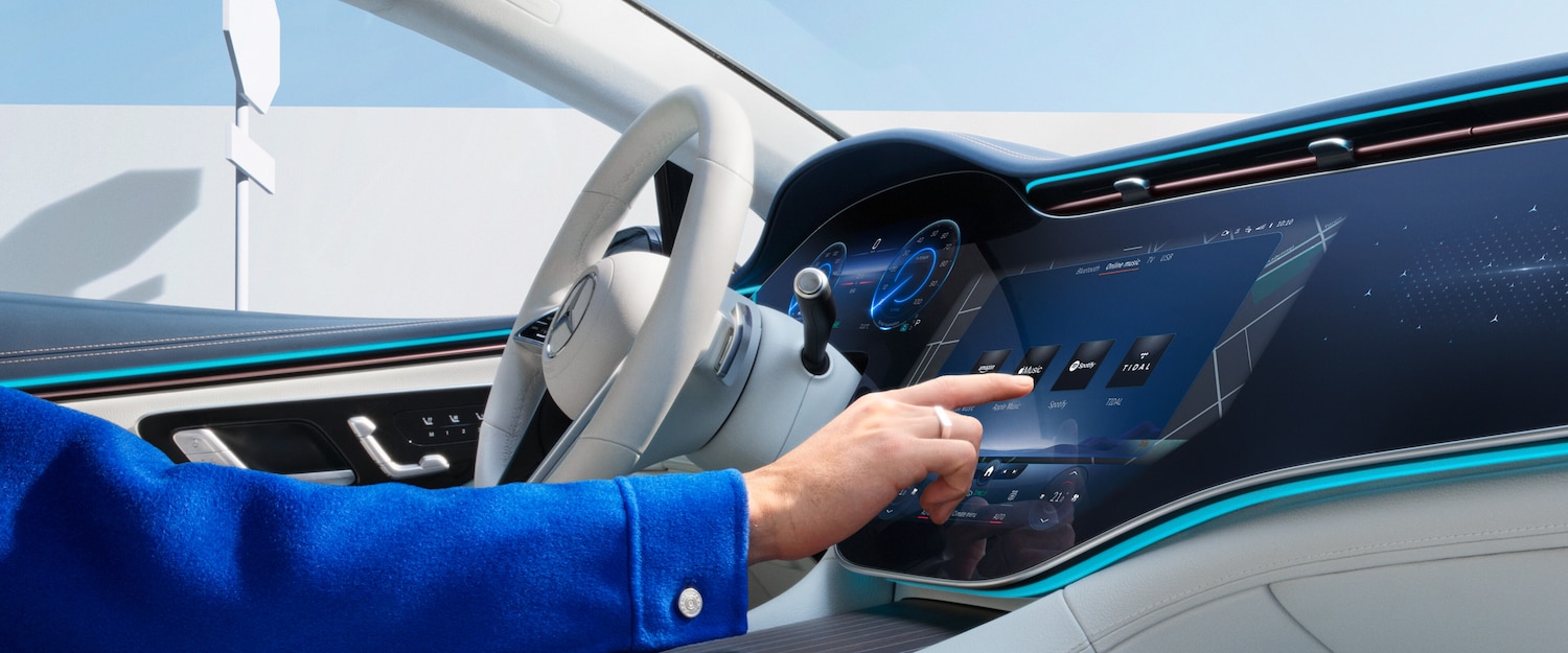 Digital Extras being selected on the screen of the MBUX multimedia system in a Mercedes-Benz.