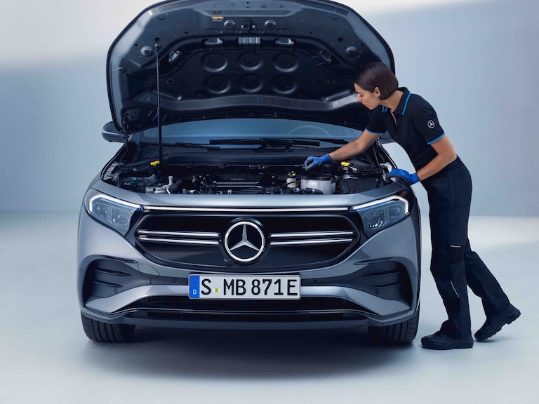 Mercedes-EQ | Mercedes-Benz A Mercedes-Benz technician checks a Mercedes-EQ.